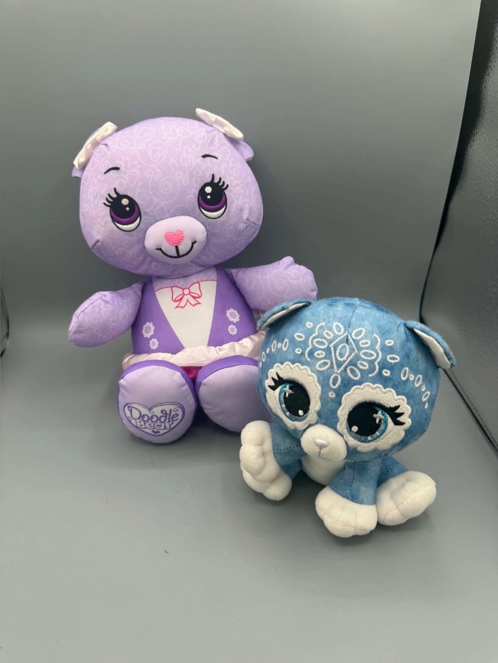 Fisher-Price Doodle Bear plushies from the early 2010s